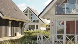 A row of modern, two-story buildings with large windows and a flat roof. - Holiday Home in Wendtorf (Wendtorf)