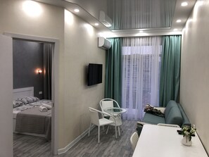 1 slaapkamer, een strijkplank/strijkijzer, wifi, beddengoed