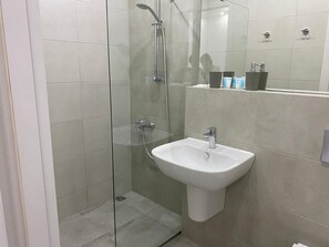 Hair dryer, towels, soap, toilet paper
