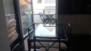 Premium Apartment | Living area | Flat-screen TV