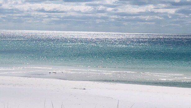 A beach with clear water and a sandy shore. - Coastal Sands located @ Gulf Terrace Condos in Destin! Sleeps 6 ~ 1BR & 1-1/2 BA (Destin)