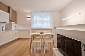 Appartamento, 1 camera da letto | Cucina privata | Frigorifero con congelatore, microonde, forno, piano cottura