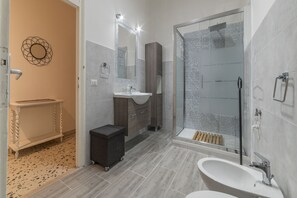 Apartment, 4 Bedrooms | Bathroom | Shower, rainfall showerhead, hair dryer, bidet