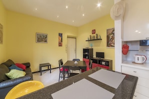 Departamento, 1 habitación | Área de sala de estar