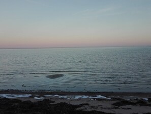 A calm sea with gentle waves at the shore. - Spacious Holiday Home in Storvorde near Sea (Storvorde)