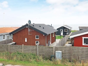 Hus | Utsikt mot vann