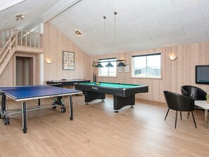 A recreational room with a ping pong table, pool table, and billiards table. - 5 Star Holiday Home in Harboore (Harboore)