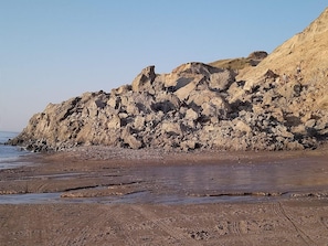 A rocky coastline with a clear sky. - 6 Person Holiday Home in Lokken (Lokken)