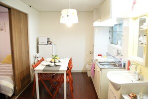 Fridge, microwave, stovetop, cookware/dishes/utensils