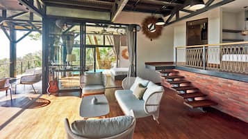 Panorama villa, uitzicht op zee | Woonruimte | Flatscreentelevisie, Netflix, een iPod-dock en boeken