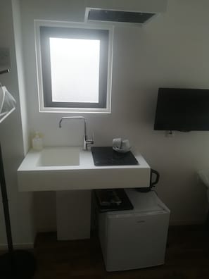 Fridge, microwave, cookware/dishes/utensils