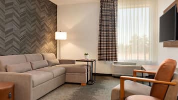 Hypo-allergenic bedding, pillowtop beds, desk, laptop workspace