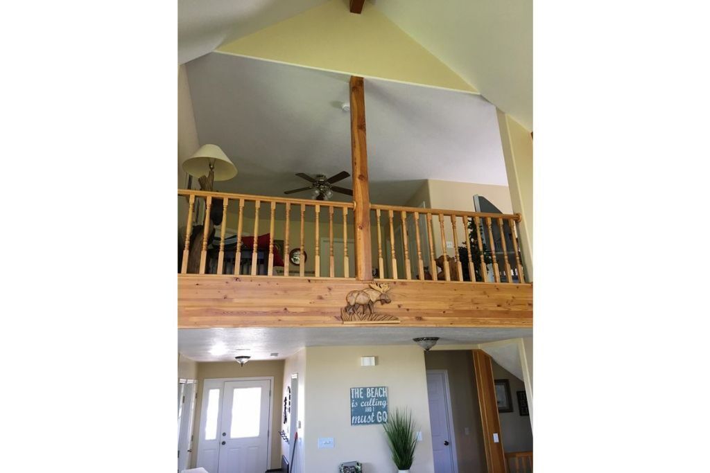 Golf Course Lakehouse with fantastic views of the lake, mountains & golf course.