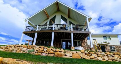 Golf Course Lakehouse with fantastic views of the lake, mountains & golf course.