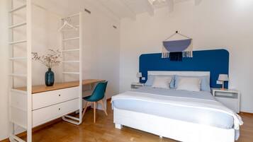 3 habitaciones, tabla de planchar con plancha y cuna de viaje