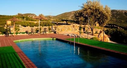 Casa rural con Jacuzzi junto a la cama