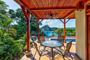Outdoor dining - Oceanfront treehouse home w/ private pool, deck, near beach (Tola)