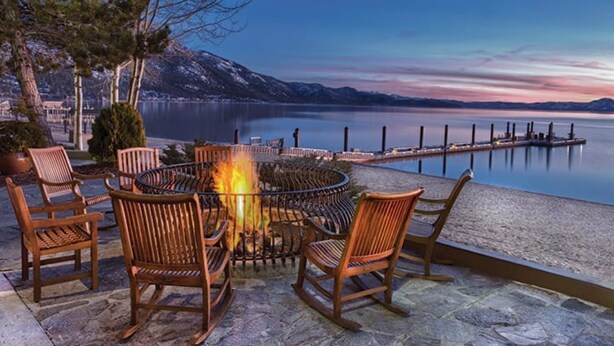 A lakeside patio with a fire pit and seating. - Fully Stocked & Spacious McCloud 3Bed/ 2.5  Walk to Lake 1-Car Garage (Incline Village)