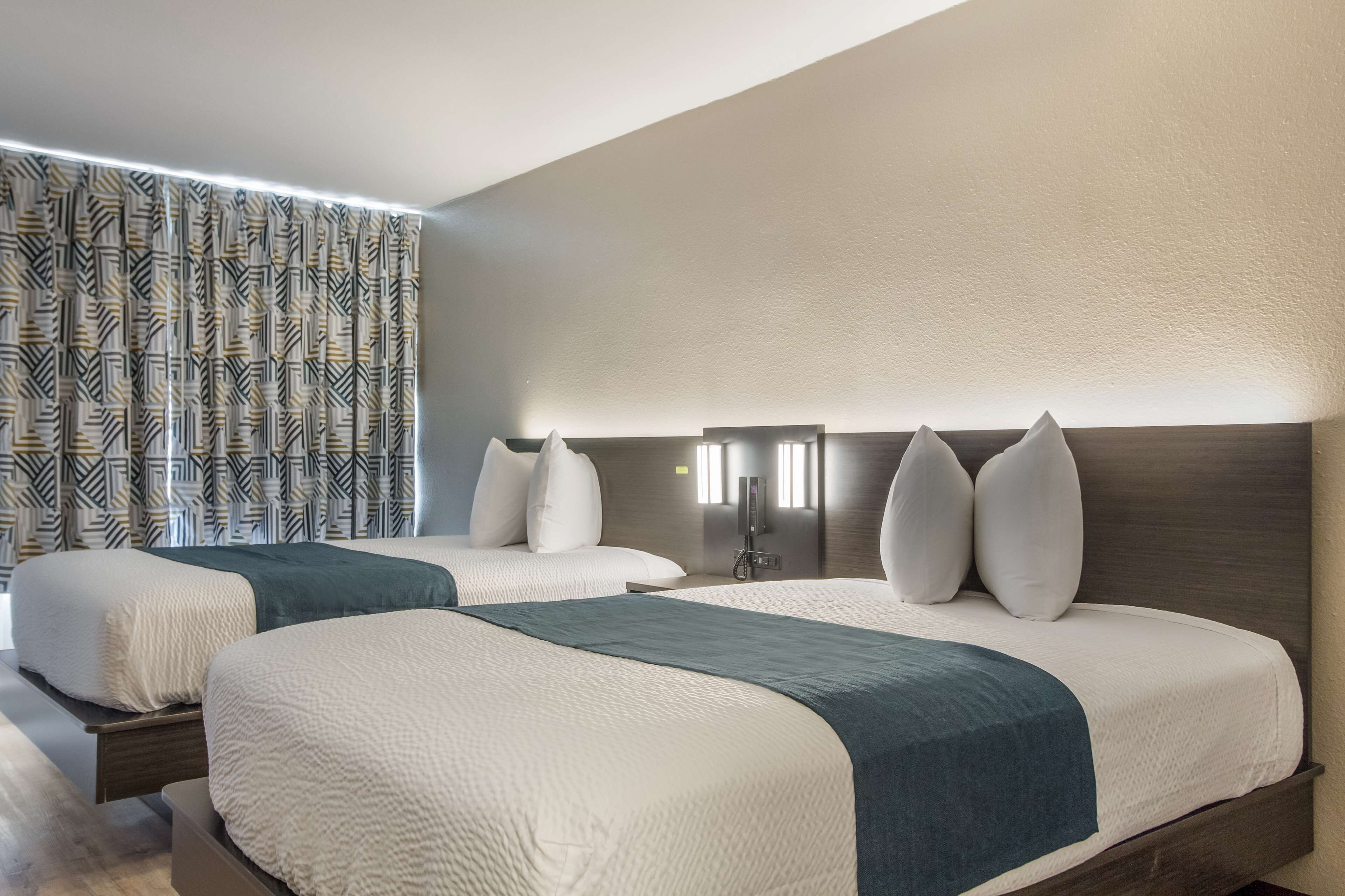 Desk, laptop workspace, free WiFi, bed sheets