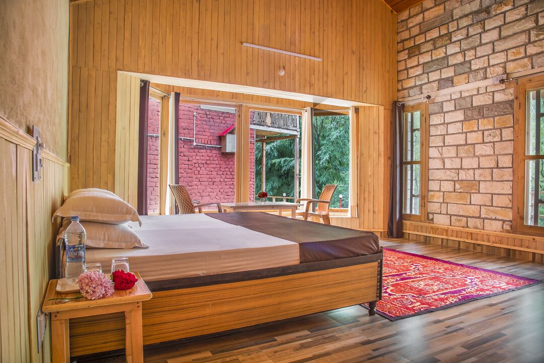 LivingStone River view Cottages in Tirthan valley