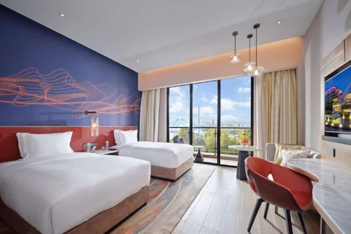 Premium bedding, down duvets, memory-foam beds, minibar