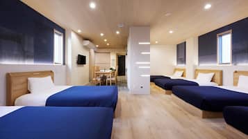Deluxe Family Suite | Iron/ironing board (on request), free WiFi, bed sheets