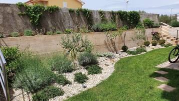 Appartamento (Basement Level) | Vista giardino