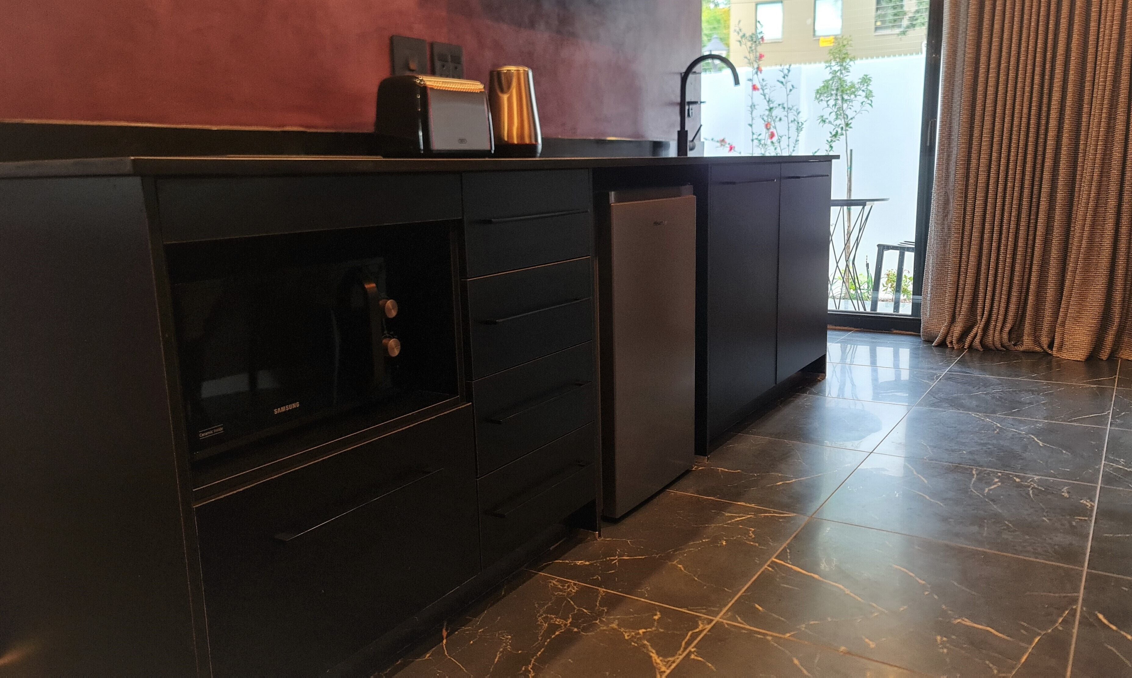 romantic suite, 1 king bed, terrace, garden area | private kitchenette | fridge, microwave, stovetop, electric kettle