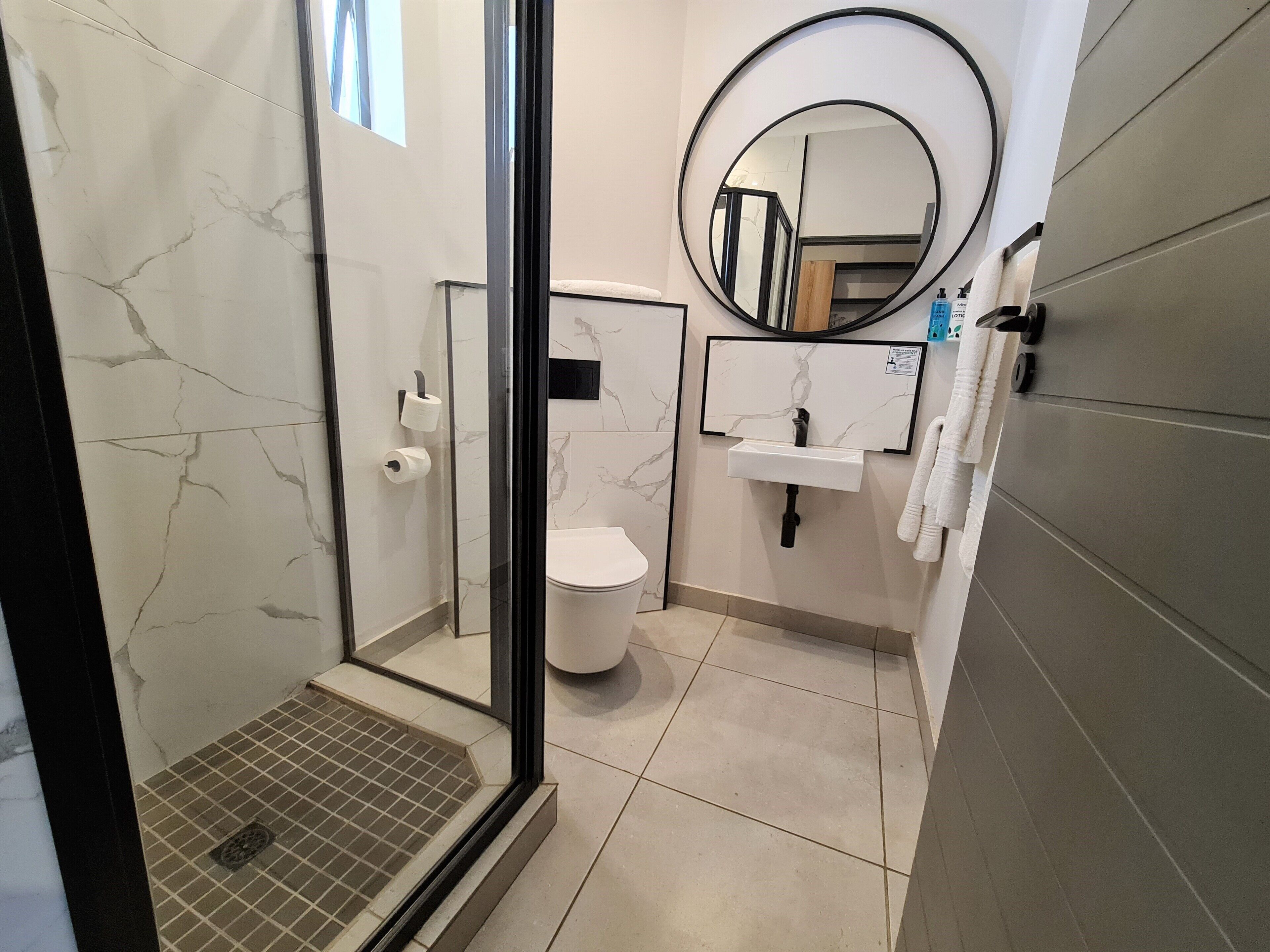 standard room | bathroom | shower, hair dryer, towels