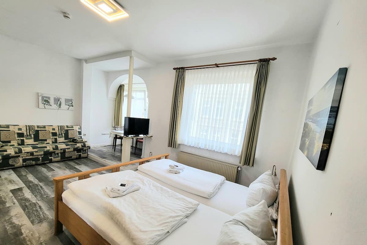 Desk, free WiFi, bed sheets