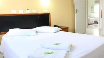 Traditional Triple Room | Minibar, in-room safe, iron/ironing board, free WiFi