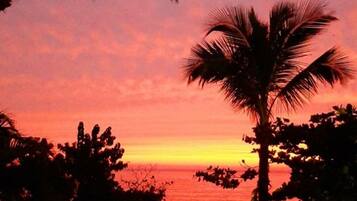 Na praia, espreguiçadeiras