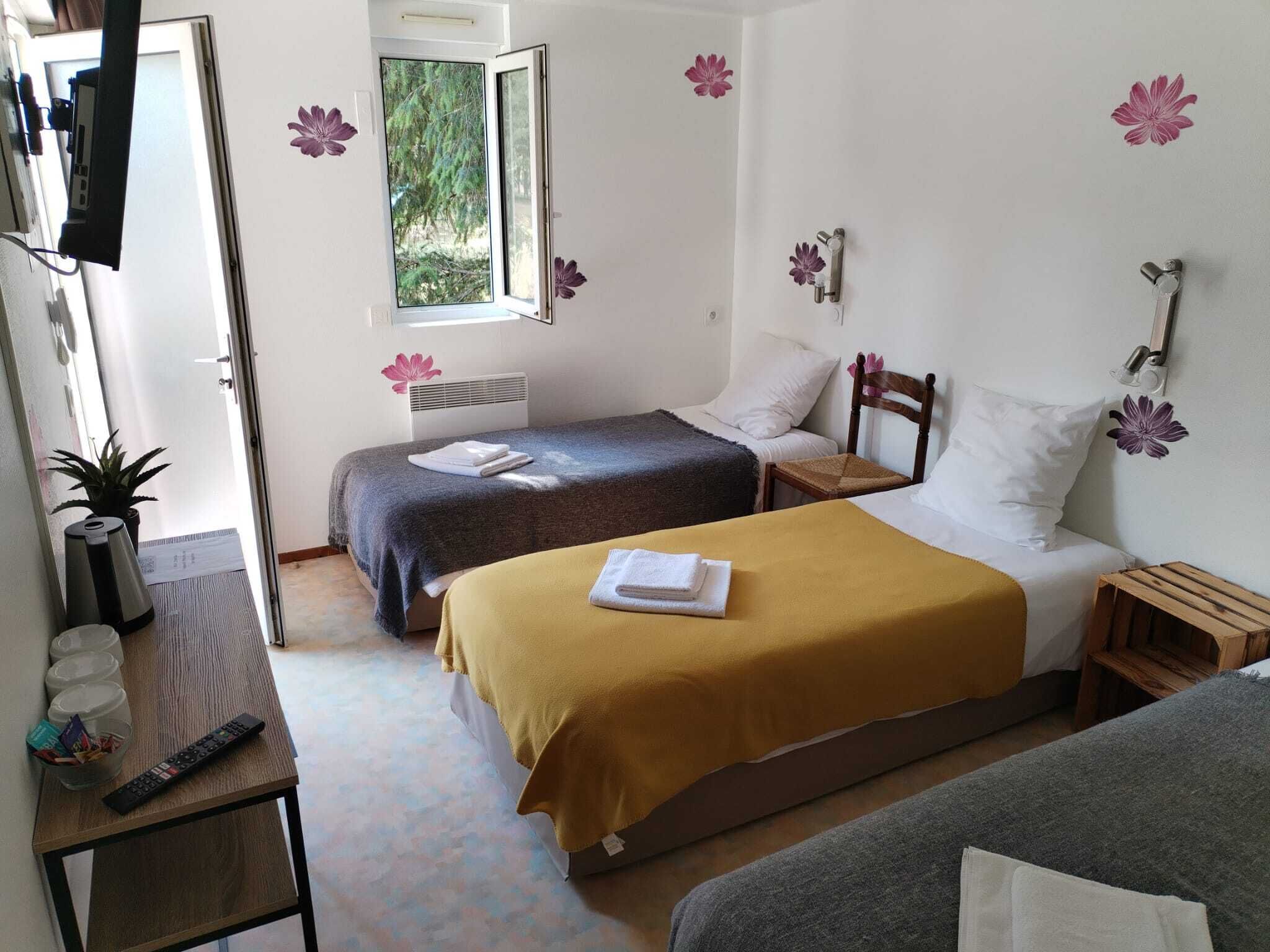 Triple Room | Blackout drapes, WiFi (free), individually decorated