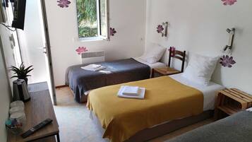 Triple Room | Blackout drapes, WiFi (free), individually decorated