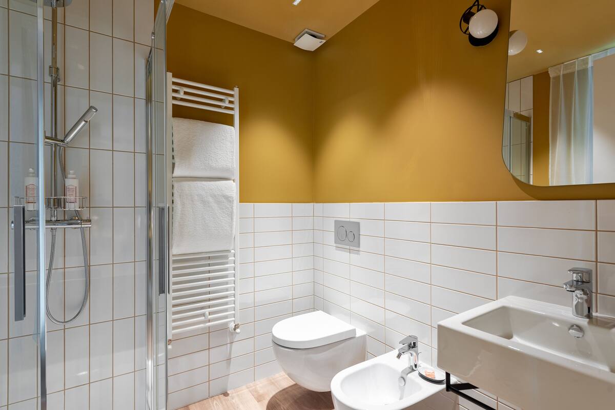 shower, rainfall showerhead, designer toiletries, hair dryer