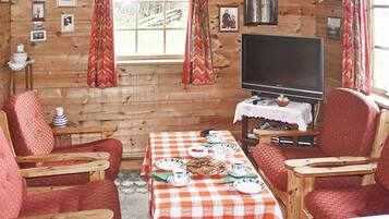 Ferienhaus | Wohnbereich | Fernseher