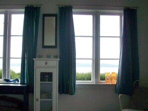 A room with a window, a cabinet, and a chair. - 6 Person Holiday Home in Aabenraa (Aabenraa)