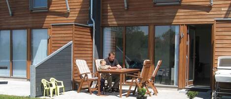 Apartamento | Restaurante al aire libre