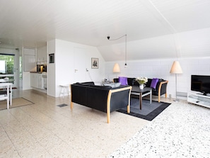 A modern living space with a kitchen, dining area, and seating area. - Quaint Holiday Home in Sjaellands Odde near Sea (Sjællands Odde)