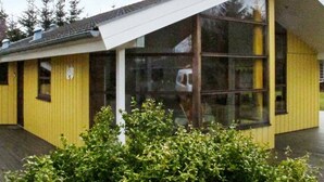 A yellow building with large windows and a sloped roof. - Luxurious Holiday Home Near Hals With Whirlpool (Hals)