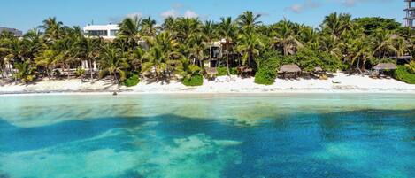 On the beach, sun loungers, beach towels
