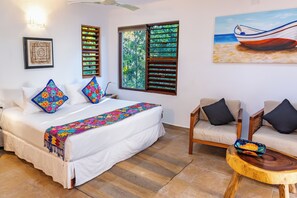 1 habitación, tabla de planchar con plancha y cuna de viaje 