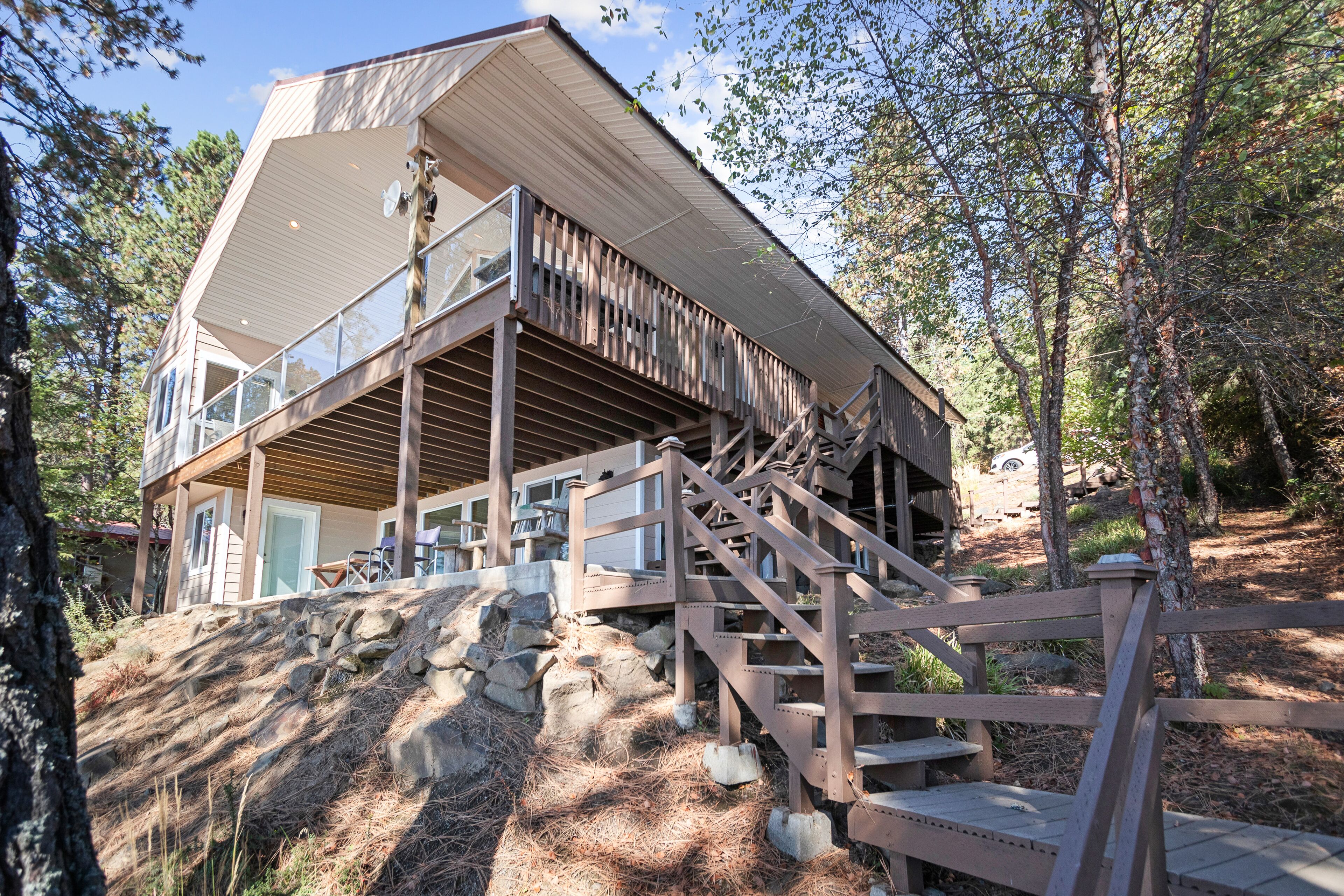 Lovely Oasis in the Trees w/Wraparound Deck, Lake View, Pool Table, & Game Room!