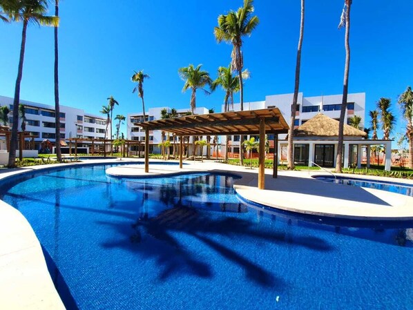 Outdoor pool - Apartment safe and fully furnished (Villas Puerto Iguanas)