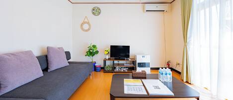 32-inch flat-screen TV with digital channels, TV