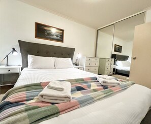 2 bedrooms, desk, iron/ironing board, cribs/infant beds