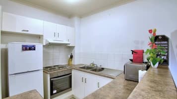 Fridge, microwave, oven, stovetop