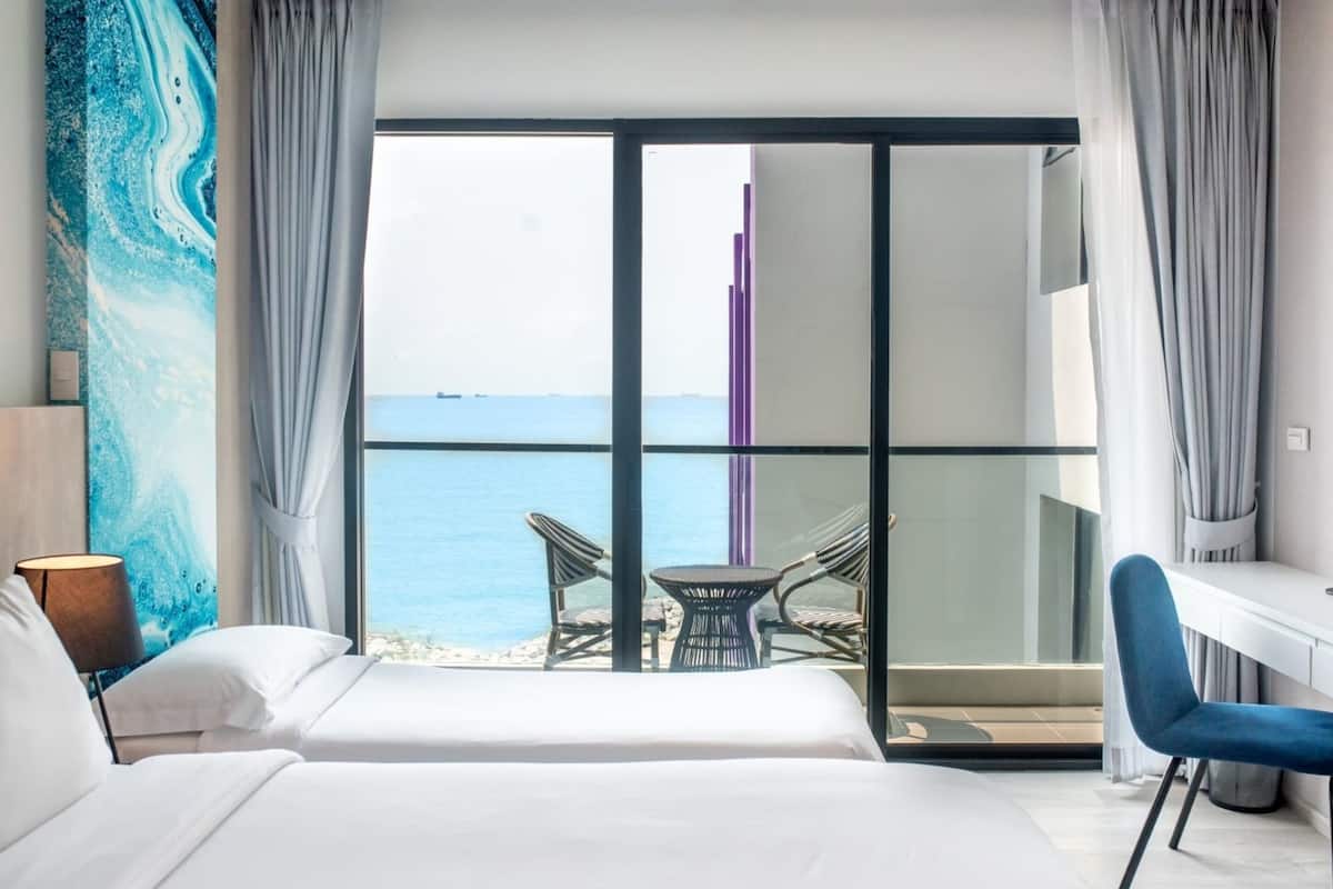 Family Room (Partial Sea View) | In-room safe, desk, laptop workspace, free WiFi