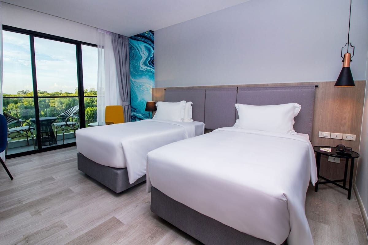 Deluxe River View Room | In-room safe, desk, laptop workspace, free WiFi