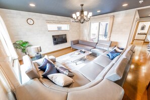 Private Vacation Home, Non Smoking | Living room | Flat-screen TV - The Worldwide House (Sapporo)